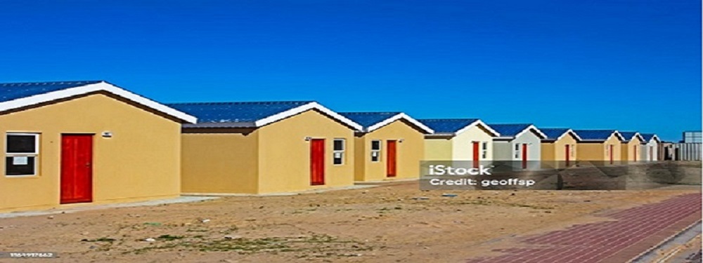 row of newly built low cost rdp homes in western cape, south africa